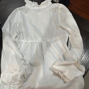 White shirt dress with pleated sides